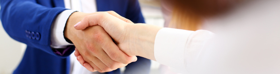 Two Businesspeople zoomed in on handshake